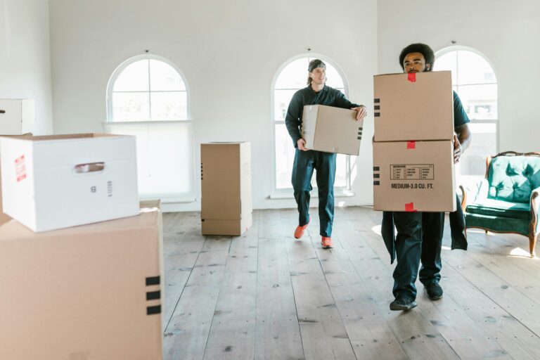 people moving boxes to a new home